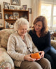 Customer with her mother holding the aki bar